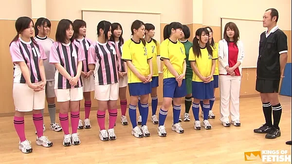 Japanese female team listen and take a lesson from their coach